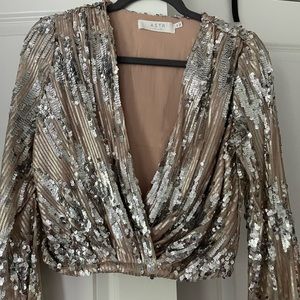 Astr sequin long sleeved wrap top
